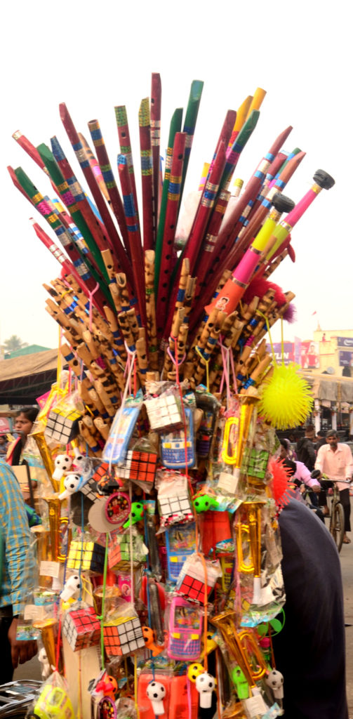 A flute seller at market near Lord Jagannath temple, Puri , Odisha.