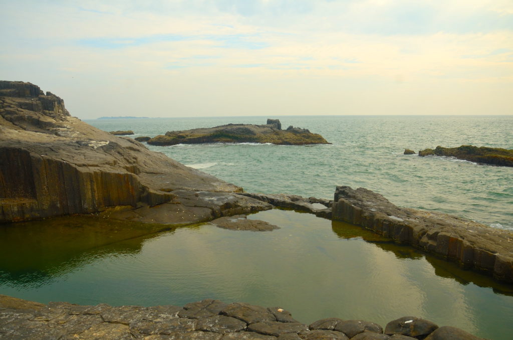 Small pools are made by sea water at St. Marry Island, near Malpe, Karnataka, India.